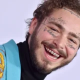 post-malone-smiling-showing-his-diamond-covered-teeth
