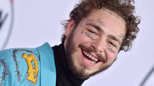 post-malone-smiling-showing-his-diamond-covered-teeth